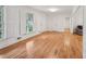 Spacious living area with hardwood floors, large windows, and white trim throughout at 1501 Memory Se Ln, Smyrna, GA 30080