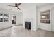 Bright sun room with tiled floors, a fireplace and view of the patio at 1501 Memory Se Ln, Smyrna, GA 30080