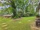 Expansive backyard featuring mature trees and lush green lawn at 2203 Second Ave, Decatur, GA 30032
