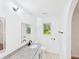 Bright bathroom featuring modern fixtures, granite countertop, and window views at 2203 Second Ave, Decatur, GA 30032