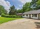 Inviting front yard with lush greenery and a cozy single-story home at 2203 Second Ave, Decatur, GA 30032