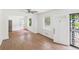 Inviting living room featuring laminated flooring, a ceiling fan, and natural light at 2203 Second Ave, Decatur, GA 30032
