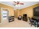 Cozy bedroom space featuring neutral carpet, ceiling fan, and an adjacent bathroom at 3071 Lenox Ne Rd # 19, Atlanta, GA 30324