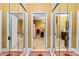 Hallway features mirrored closet doors and access to bathrooms at 3071 Lenox Ne Rd # 19, Atlanta, GA 30324