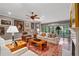 Cozy living room with a fireplace, lots of natural light, and a balcony at 3071 Lenox Ne Rd # 19, Atlanta, GA 30324