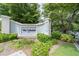 Well-maintained landscaping surrounds The Vanderbilt community sign at 3071 Lenox Ne Rd # 19, Atlanta, GA 30324