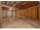 Unfinished basement with exposed insulation and framing ready for expansion and customization at 565 Lance View Ln, Lawrenceville, GA 30045