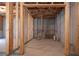 Unfinished basement with concrete walls and plumbing fixtures at 565 Lance View Ln, Lawrenceville, GA 30045