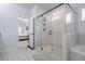 Beautiful bathroom featuring a glass shower and view into the main bedroom at 565 Lance View Ln, Lawrenceville, GA 30045