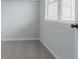 Walk-in closet with a window and white shelving at 565 Lance View Ln, Lawrenceville, GA 30045