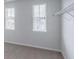 Walk-in closet with a window and wire shelving at 565 Lance View Ln, Lawrenceville, GA 30045