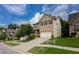 Attractive two-story brick home with a well-kept lawn and a spacious driveway at 565 Lance View Ln, Lawrenceville, GA 30045