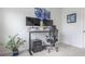 Modern office space featuring a sit-stand desk setup with dual monitors and an ergonomic chair at 565 Lance View Ln, Lawrenceville, GA 30045