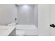 Tiled bathroom with modern fixtures, including a shower-tub combination and toilet at 2396 Lawrenceville Hwy # V, Decatur, GA 30033