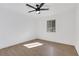 Bright bedroom with hardwood floors, ceiling fan and a window for natural light at 2396 Lawrenceville Hwy # V, Decatur, GA 30033