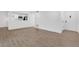 Inviting living room with laminate flooring and a view of the adjacent kitchen at 2396 Lawrenceville Hwy # V, Decatur, GA 30033
