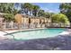Community pool area with lounge chairs and well maintained landscaping at 2396 Lawrenceville Hwy # V, Decatur, GA 30033