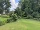 Spacious backyard with lush landscaping at 25 Darcee Ct, Lawrenceville, GA 30046