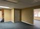 Spacious basement featuring neutral walls and access to additional rooms at 25 Darcee Ct, Lawrenceville, GA 30046