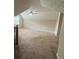 Large bonus room with window and neutral walls at 25 Darcee Ct, Lawrenceville, GA 30046