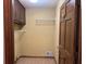 Small closet area for storage with shelving and neutral walls at 25 Darcee Ct, Lawrenceville, GA 30046
