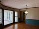 Spacious kitchen featuring hardwood floors, wood trim, and a window at 25 Darcee Ct, Lawrenceville, GA 30046