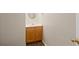 Half bathroom featuring wood-look flooring, a vanity and a mirror at 3300 Suttles Sw Dr, Atlanta, GA 30331