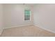 Cozy bedroom with neutral carpeting and a window that provides natural light at 3300 Suttles Sw Dr, Atlanta, GA 30331