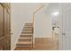 Inviting entryway with hardwood floors and a staircase leading to the upper level at 3300 Suttles Sw Dr, Atlanta, GA 30331
