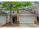 Charming townhome with a two-car garage and well-maintained landscaping at 3300 Suttles Sw Dr, Atlanta, GA 30331