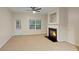 Comfortable living room with a fireplace, natural light, and outdoor access at 3300 Suttles Sw Dr, Atlanta, GA 30331