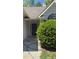 Elegant front door with side windows, and a large bush providing curb appeal at 3510 Hog Mountain Rd, Dacula, GA 30019