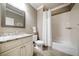 Well-lit bathroom featuring white subway tile, a granite countertop, and a shower/tub combination at 406 Mareeba Park # 61, Canton, GA 30114