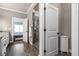 Stylish bathroom showcasing a glass enclosed shower, wood-look tile flooring, and white cabinets at 406 Mareeba Park # 61, Canton, GA 30114