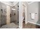 Modern bathroom featuring a tiled glass shower with decorative tile accent and a separate toilet room at 406 Mareeba Park # 61, Canton, GA 30114
