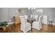 Elegant dining room with glass-top table, stylish chairs, and classic decor, creating a sophisticated ambiance at 406 Mareeba Park # 61, Canton, GA 30114