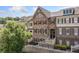 Townhome with stone and wood accents, multiple windows and stairs to the front door at 406 Mareeba Park # 61, Canton, GA 30114