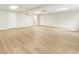 Spacious basement featuring light wood flooring, recessed lighting, and white doors at 251 Waller Nw Cir, Marietta, GA 30064