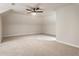 Large bedroom showcasing neutral carpeting and a modern ceiling fan at 251 Waller Nw Cir, Marietta, GA 30064