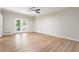 Spacious bedroom with lots of natural light, a ceiling fan, and access to the backyard at 251 Waller Nw Cir, Marietta, GA 30064