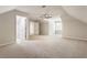 Spacious bedroom with neutral carpet, ceiling fan, and a window providing natural light at 251 Waller Nw Cir, Marietta, GA 30064