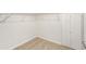 Walk-in closet with shelves and carpet, offering ample storage space at 251 Waller Nw Cir, Marietta, GA 30064