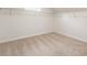 Spacious walk-in closet features neutral carpet, ample storage, and fresh paint at 251 Waller Nw Cir, Marietta, GA 30064