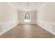 A spacious dining room with modern light fixture and wood floor at 251 Waller Nw Cir, Marietta, GA 30064