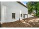 White painted brick exterior with a side entry garage and well maintained yard at 251 Waller Nw Cir, Marietta, GA 30064