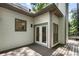 A home's exterior showcases a wood deck and double doors at 251 Waller Nw Cir, Marietta, GA 30064