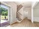 View of the front foyer with hardwood floors and stairs with iron railings at 251 Waller Nw Cir, Marietta, GA 30064