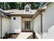 Front entrance of a house with a beautiful brick walkway and updated facade at 251 Waller Nw Cir, Marietta, GA 30064