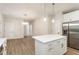 Kitchen featuring white cabinets, stainless steel appliances, and center island at 251 Waller Nw Cir, Marietta, GA 30064