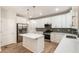 Kitchen featuring white cabinets, stainless steel appliances, and center island at 251 Waller Nw Cir, Marietta, GA 30064